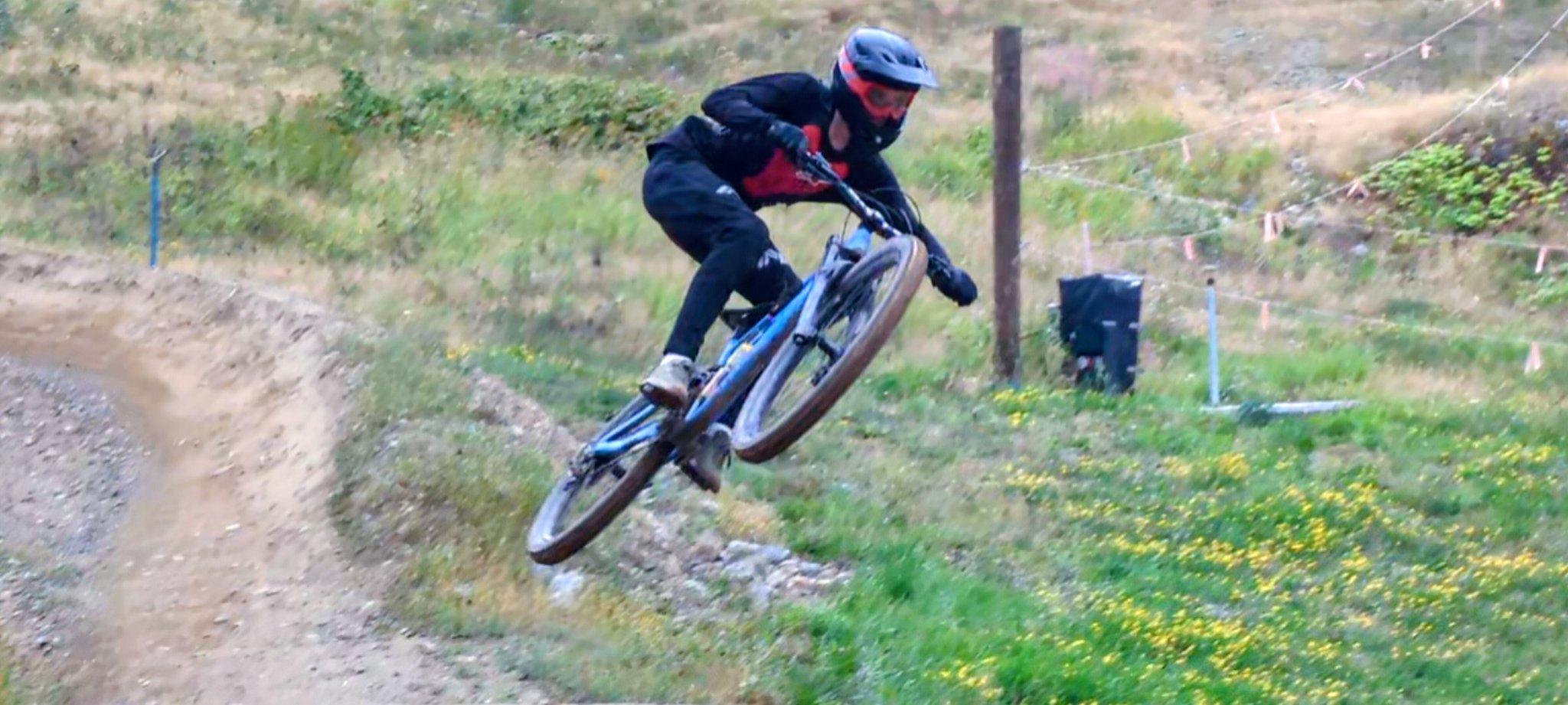 Sam, age 15, jumping his bike at Whistler